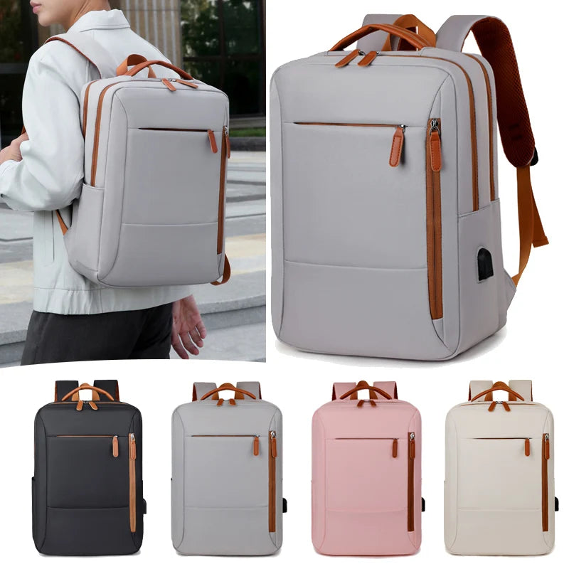 Gray backpack with brown straps worn by a person, displayed against a white background.