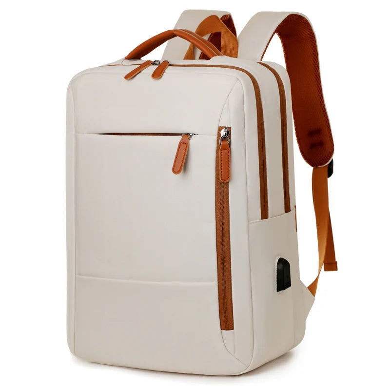 Beige backpack with brown straps on a white background