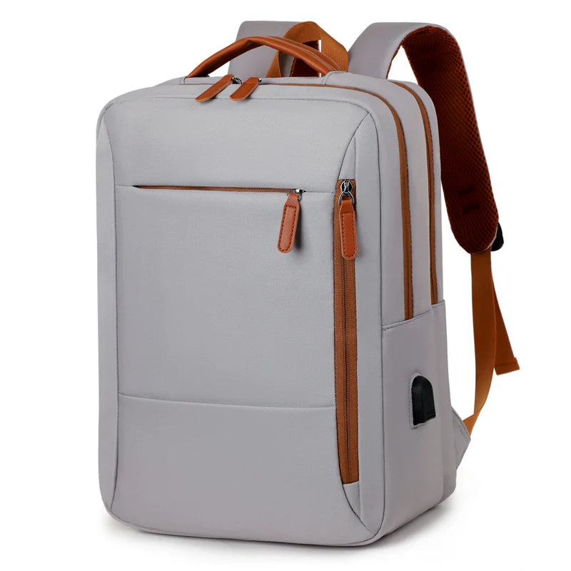 Gray backpack with brown accents on a white background