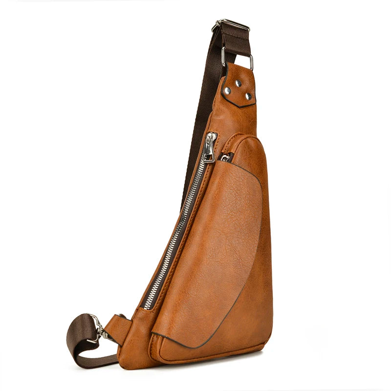 Brown leather sling bag with a strap on a white background