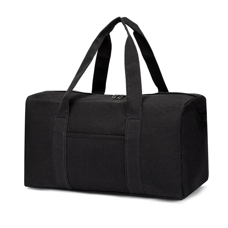Black duffel bag with straps on a white background