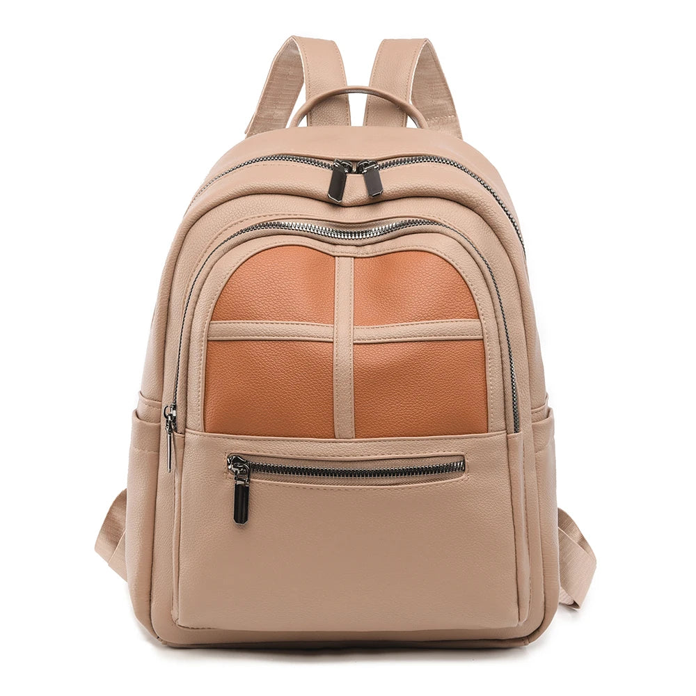 Beige backpack with brown leather panel on a white background