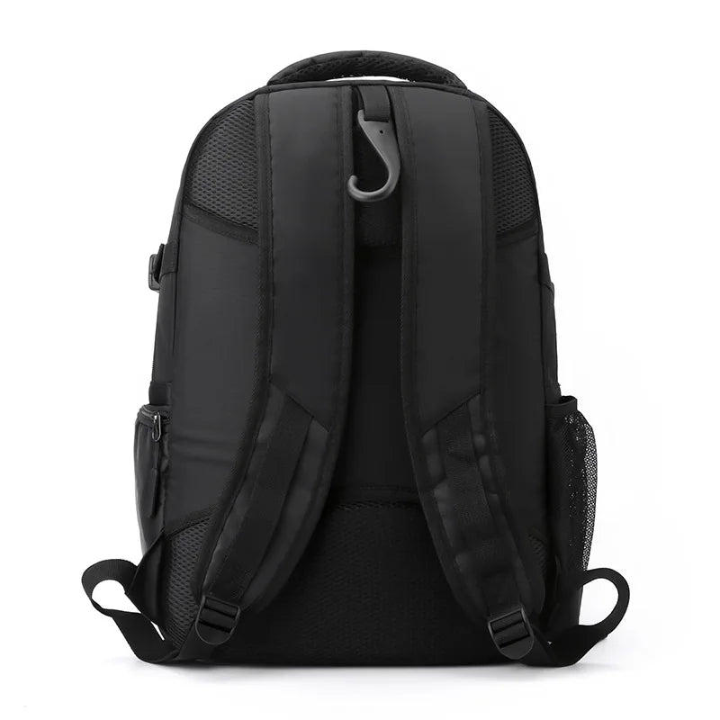 Black backpack shown from the back on a white background
