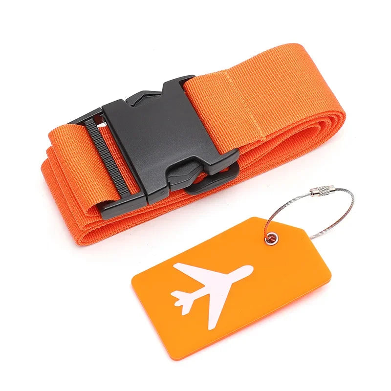 Orange luggage strap with black buckle and matching luggage tag on a white background