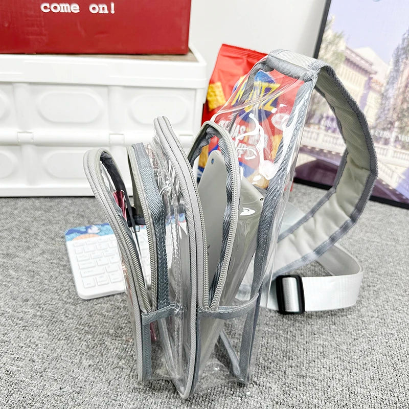 Clear mesh bag with compartments on a gray surface