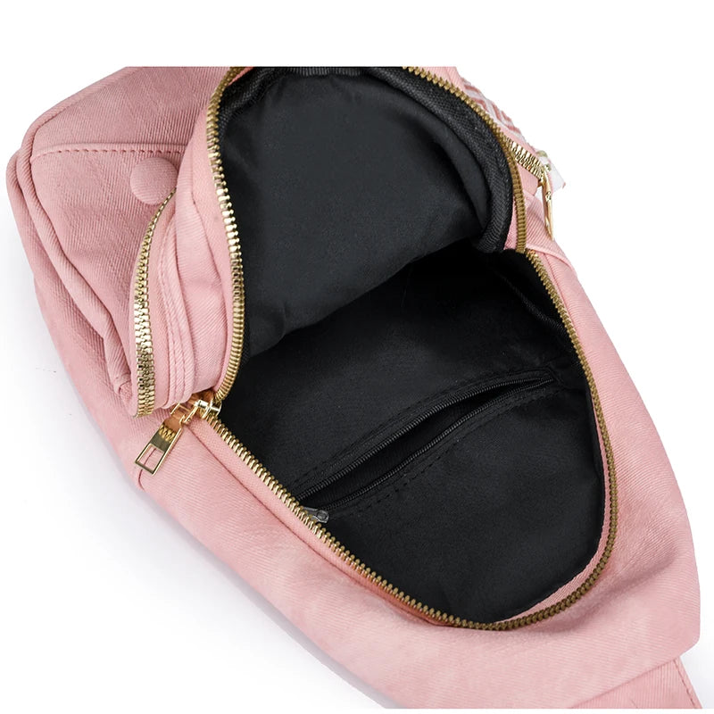 Pink bag with gold zipper on a white background