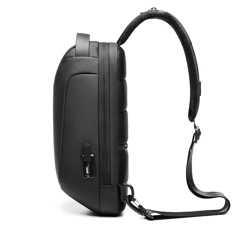 Black backpack with USB port on a white background