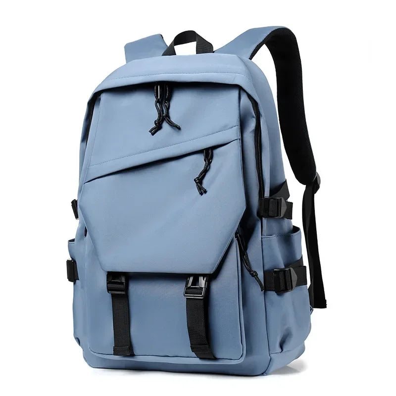 Blue backpack with black straps on a white background