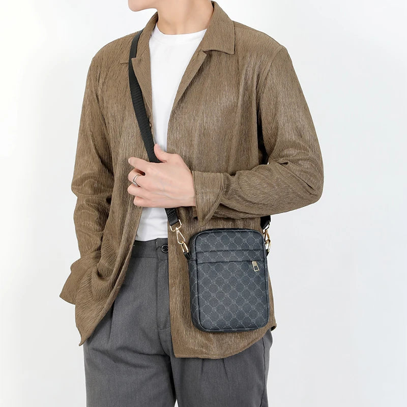 Person wearing a brown jacket with a gray crossbody bag on a white background