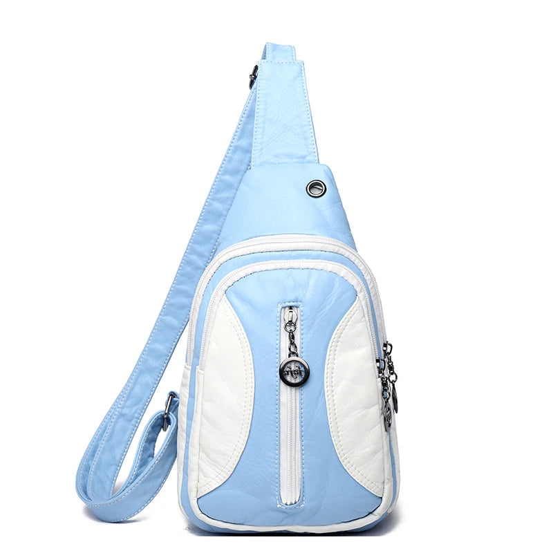 Light blue and white crossbody bag on a white background