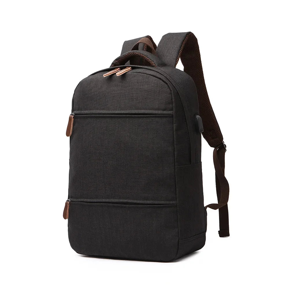 Black backpack with brown accents on a white background