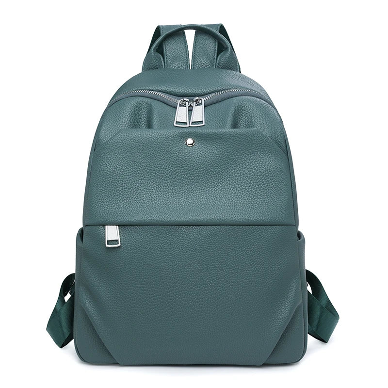 Green backpack on a white background