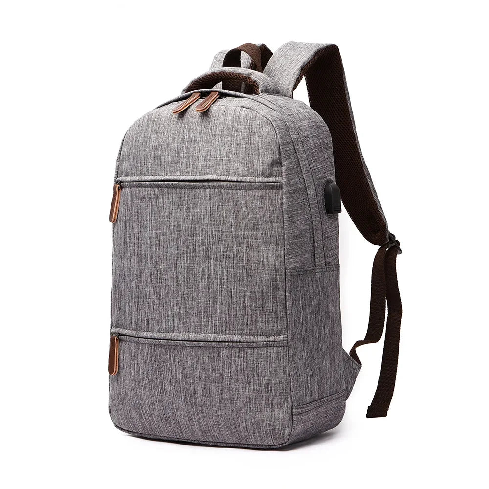 Gray backpack with brown accents on a white background