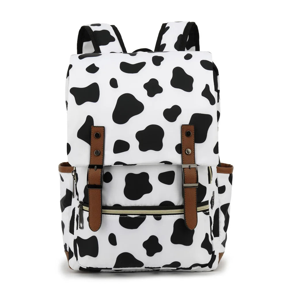 Backpack with cow print pattern on a white background