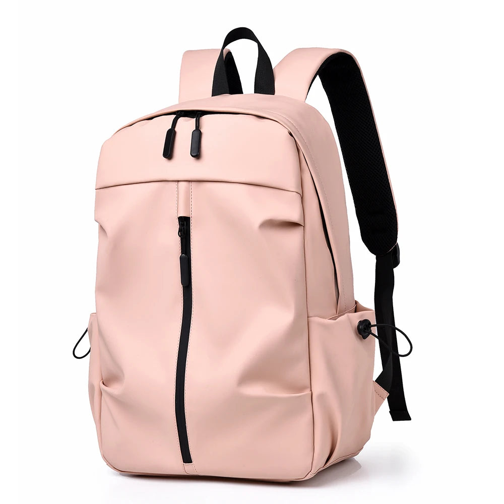 Pink backpack with black straps and zippers on a white background