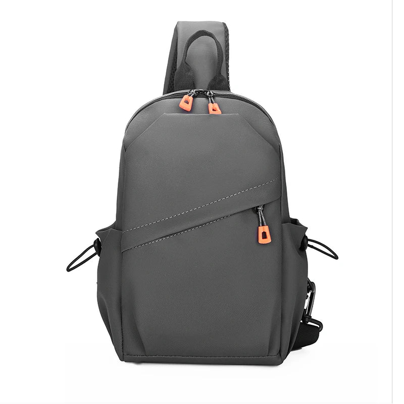 Gray backpack with orange zippers on a white background