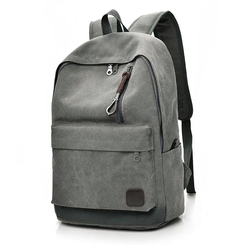 Gray backpack with a front pocket on a white background