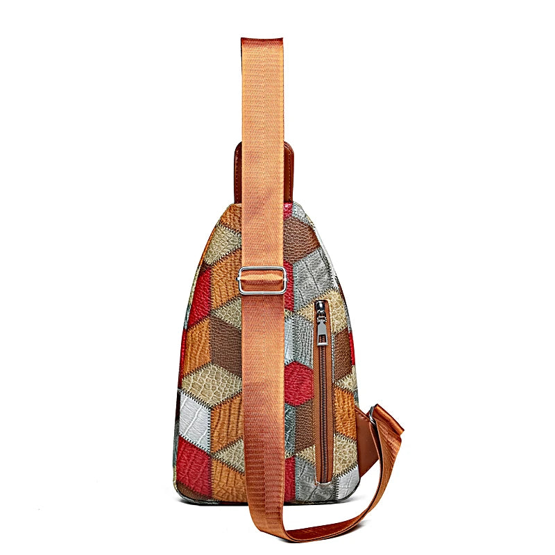 Multicolored patterned sling bag with a brown strap on a white background