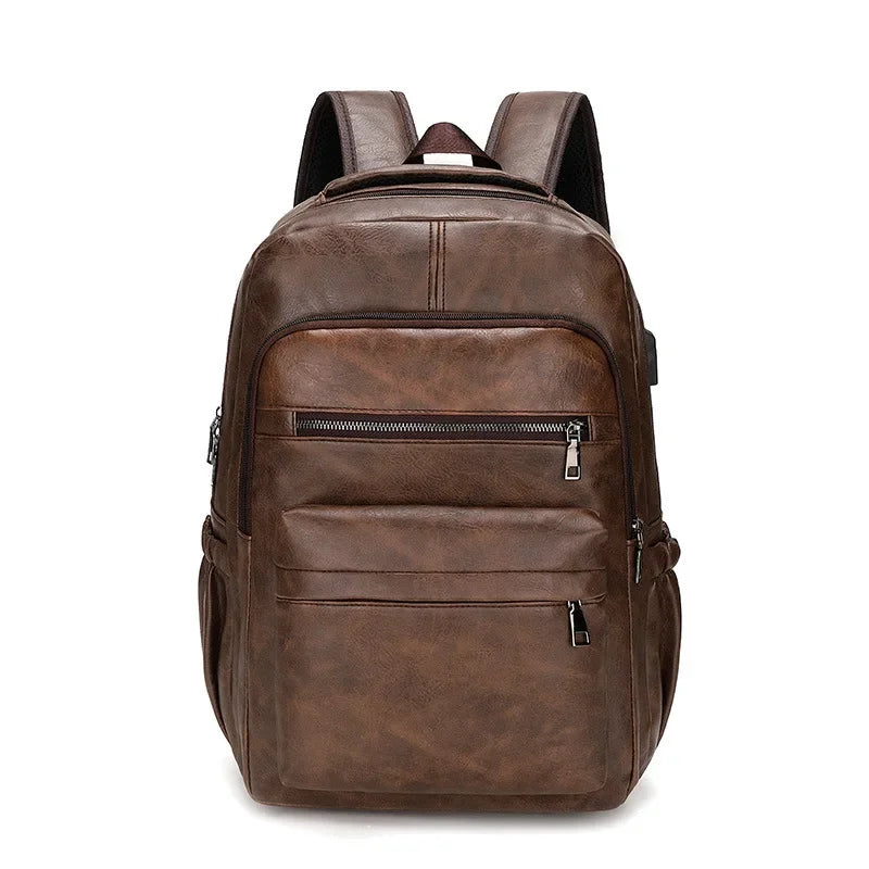 Brown leather backpack on a white background