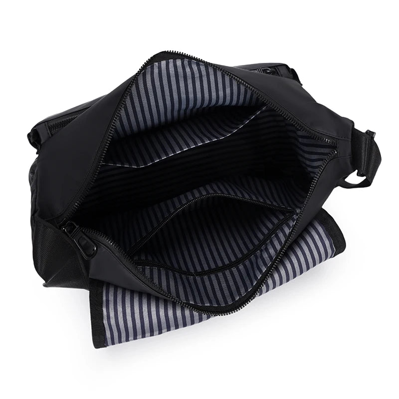 Black bag with striped lining on a white background