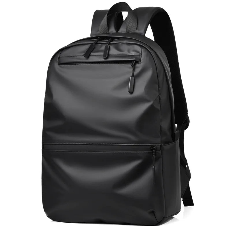 Stylish black backpack with waterproof material and multiple compartments for laptops and essentials.