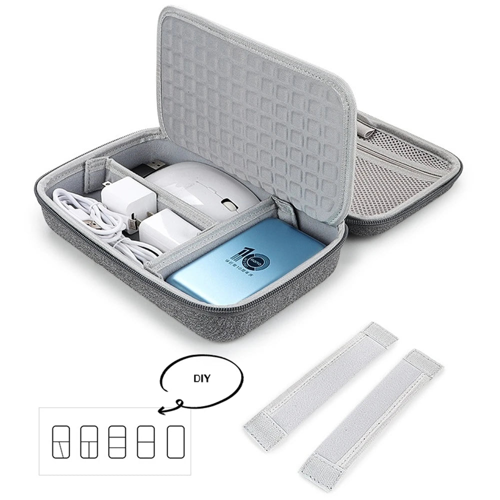 Gray travel case with electronic items and DIY labels on a white background