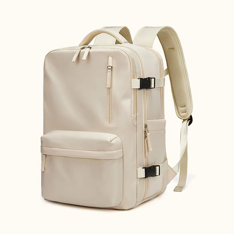 Beige backpack with multiple zippers on a white background
