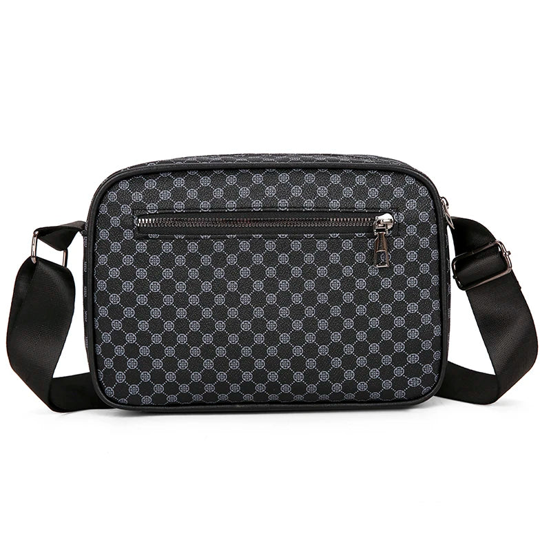 Black patterned shoulder bag on a white background