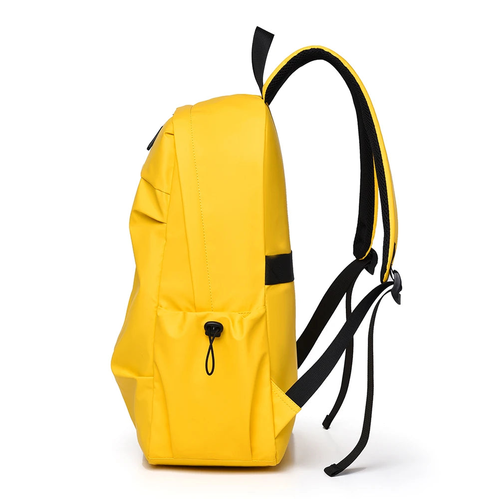Yellow backpack with black straps on a white background