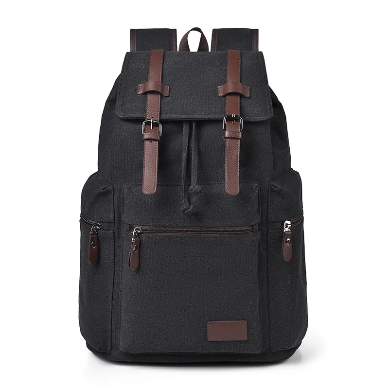 Black backpack with brown straps and accents on a white background