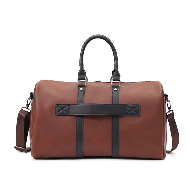 Brown leather duffel bag with black straps on a white background