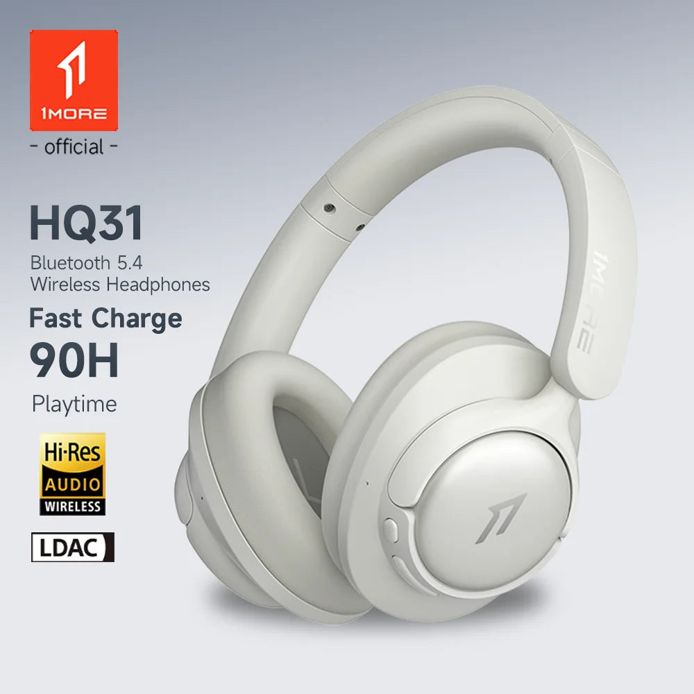 White headphones with IMore branding on a light gray background