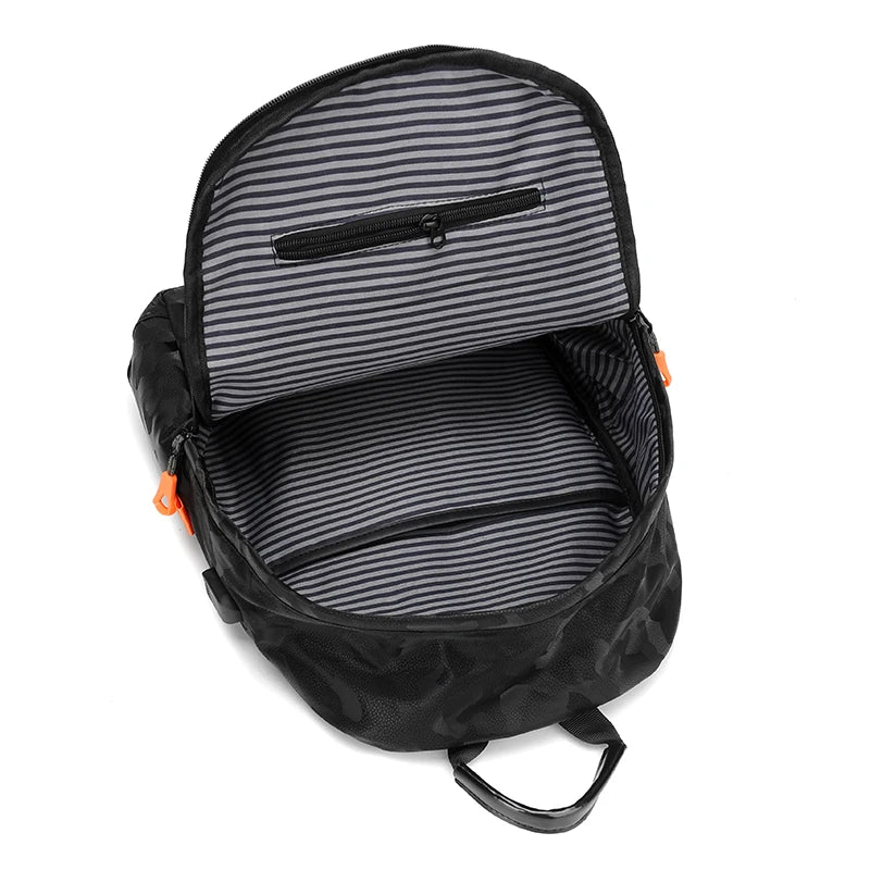 Black backpack with striped interior on a white background