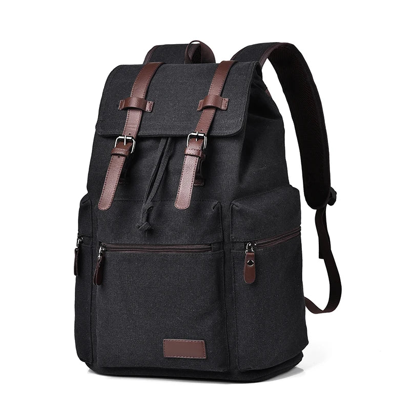 Black backpack with brown straps and accents on a white background