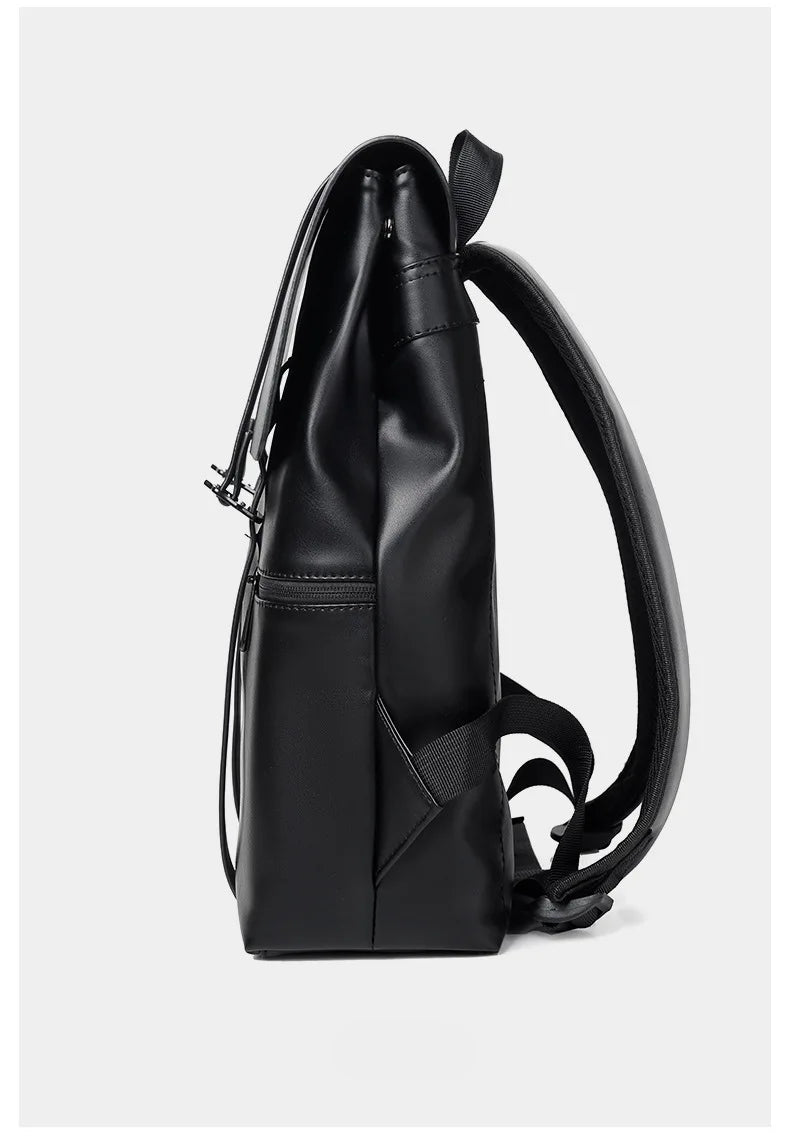 Black backpack on a light gray background