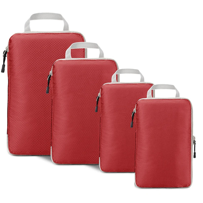 Set of four red packing cubes with handles on a white background