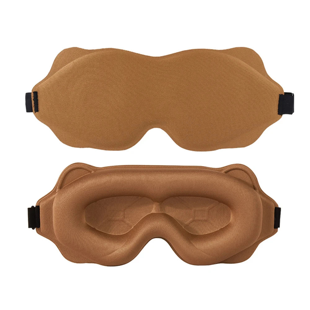 Two brown sleep masks on a white background