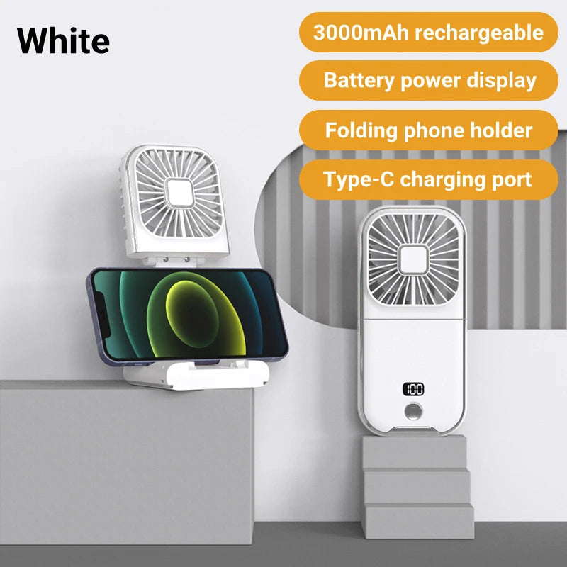 White portable fan with phone holder and charging port on a gray background