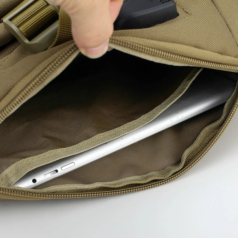 Brown bag with a zipper being opened to reveal a silver laptop inside.