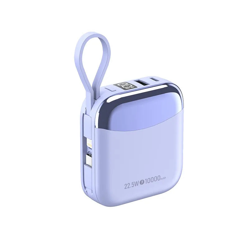 Purple power bank with USB ports on a white background
