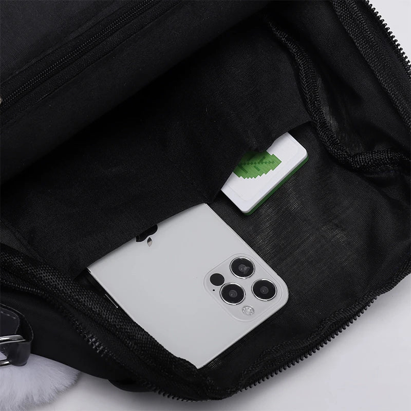 Black backpack with a smartphone and white card inside
