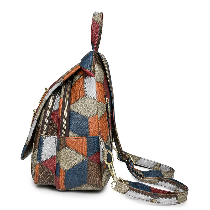 Multicolored patchwork bag with a strap on a white background