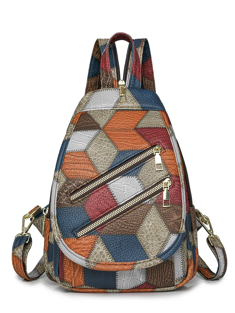 Multicolored patchwork backpack with zippers on a white background