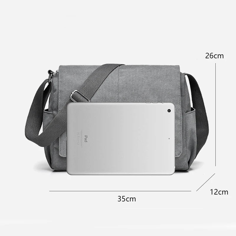 Gray shoulder bag with dimensions labeled on a white background