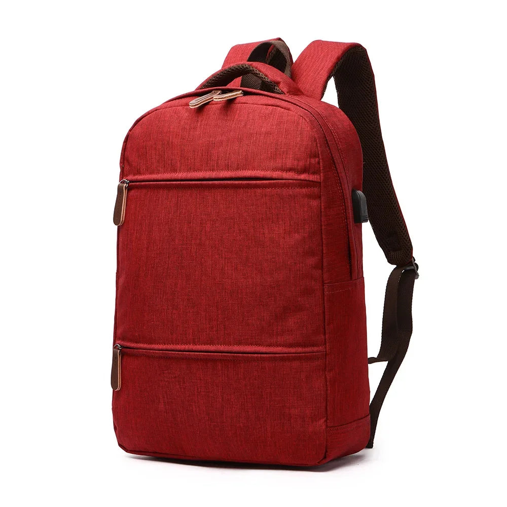Red backpack on a white background