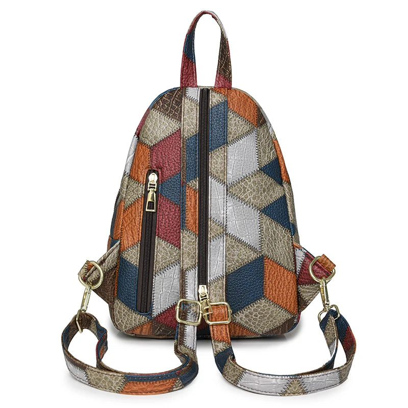 Multicolored geometric patterned backpack on a white background