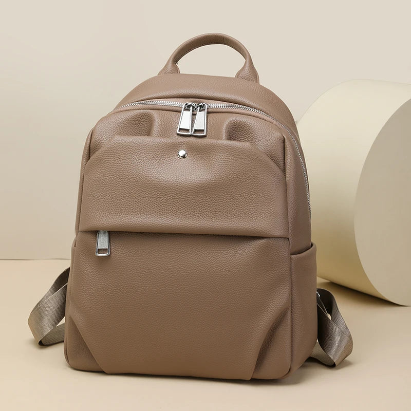 Beige backpack on a beige background