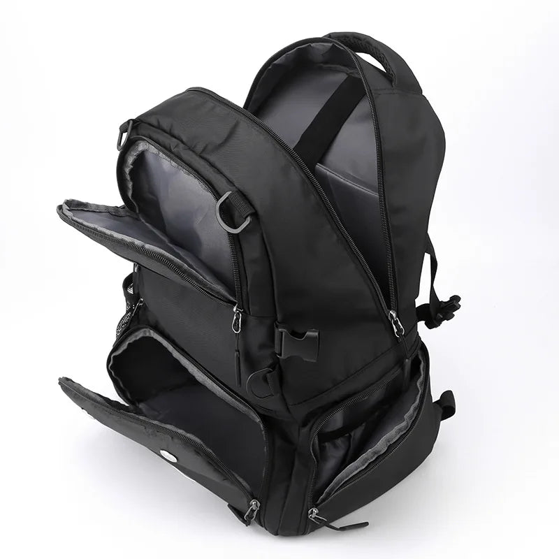 Black backpack with open compartment on a white background