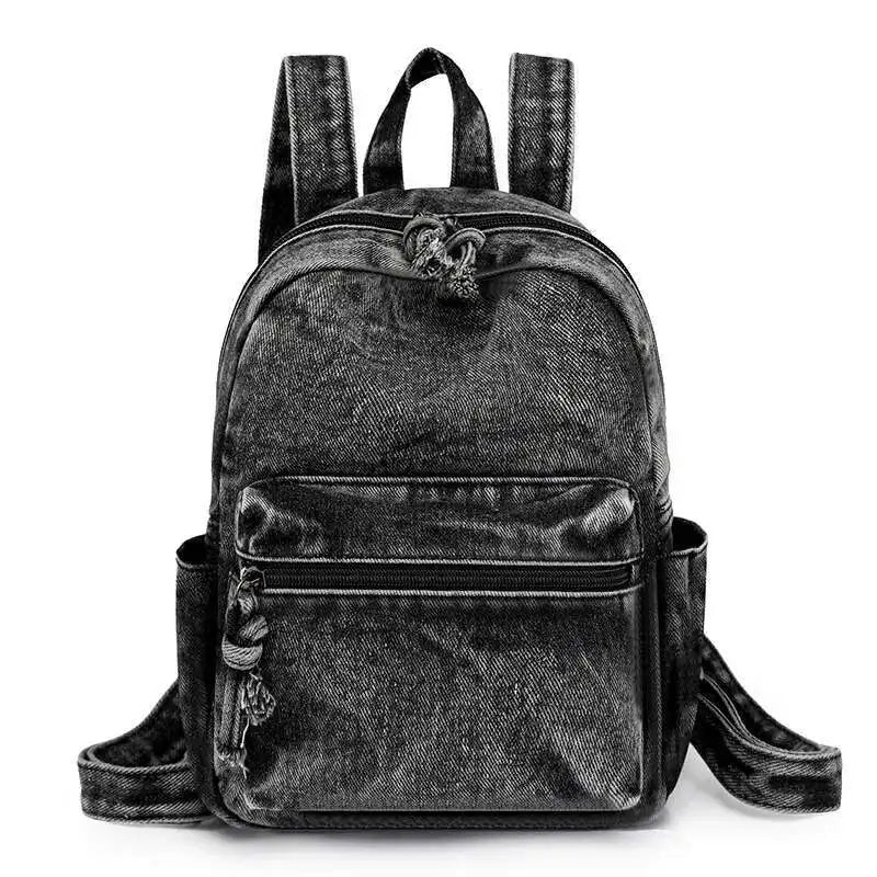 Black denim backpack on a white background