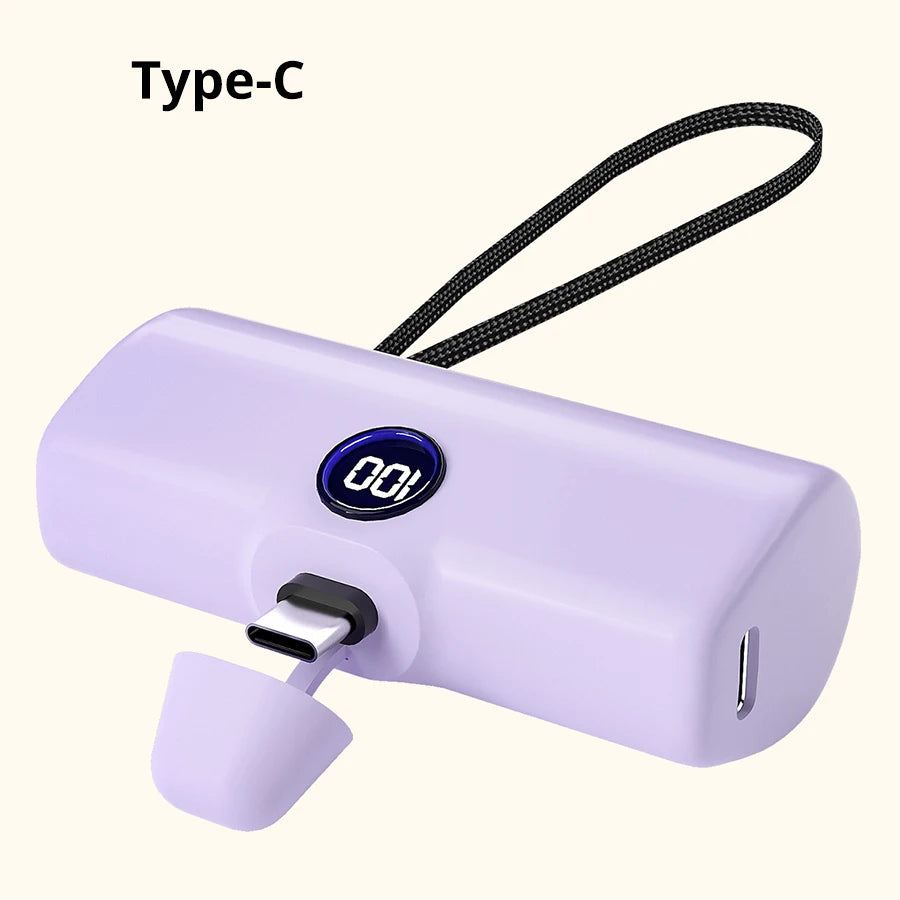 Purple power bank with digital display and Type-C connector on a white background